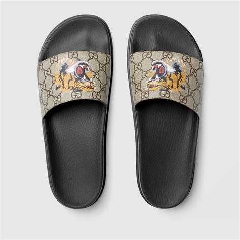 gucci supreme tiger slides|gucci gg supreme slides.